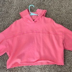 Pink cropped Under Armor hoodie